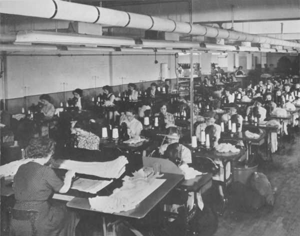 Right below: The seaming room. The inspector in the foreground takes samples for checking from all knitting departments and gives them detailed examination